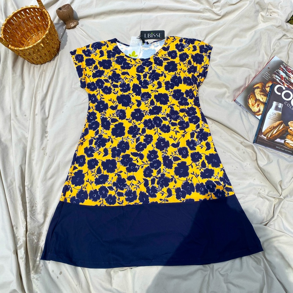 Light fun floral dress. Soft material and so comfortable! New with tags!